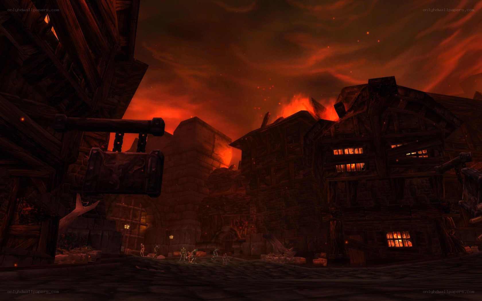 burning village at dusk