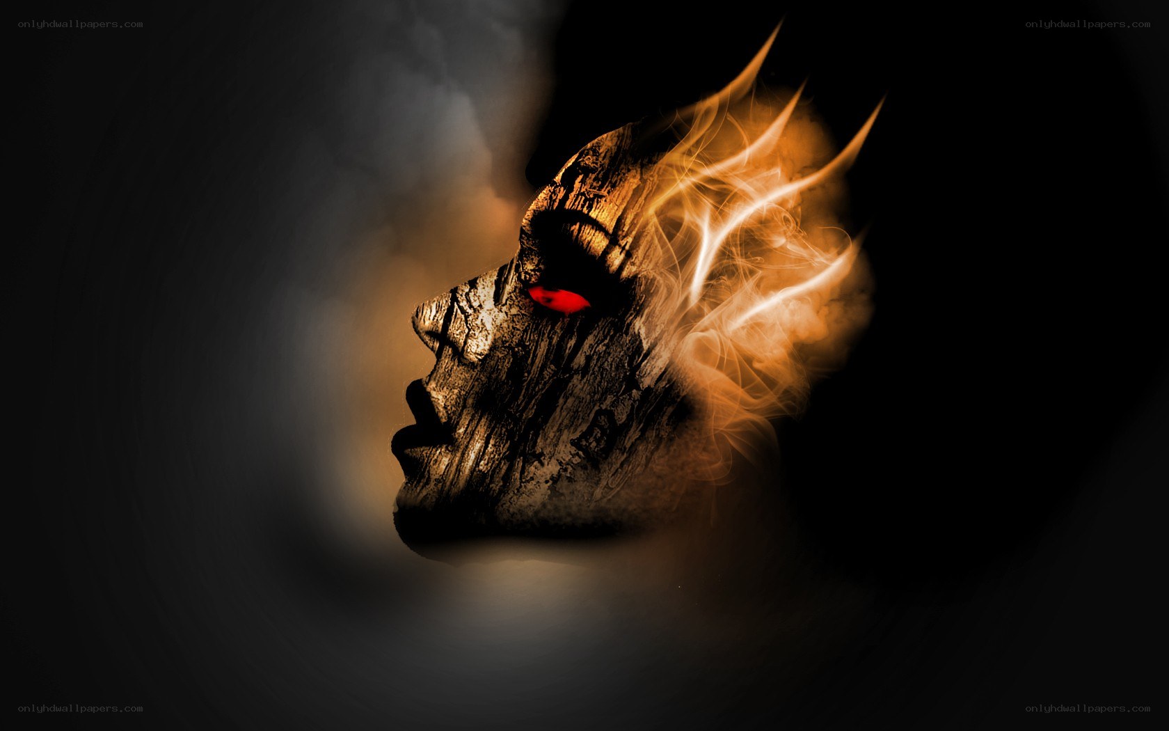 burning wooden mask