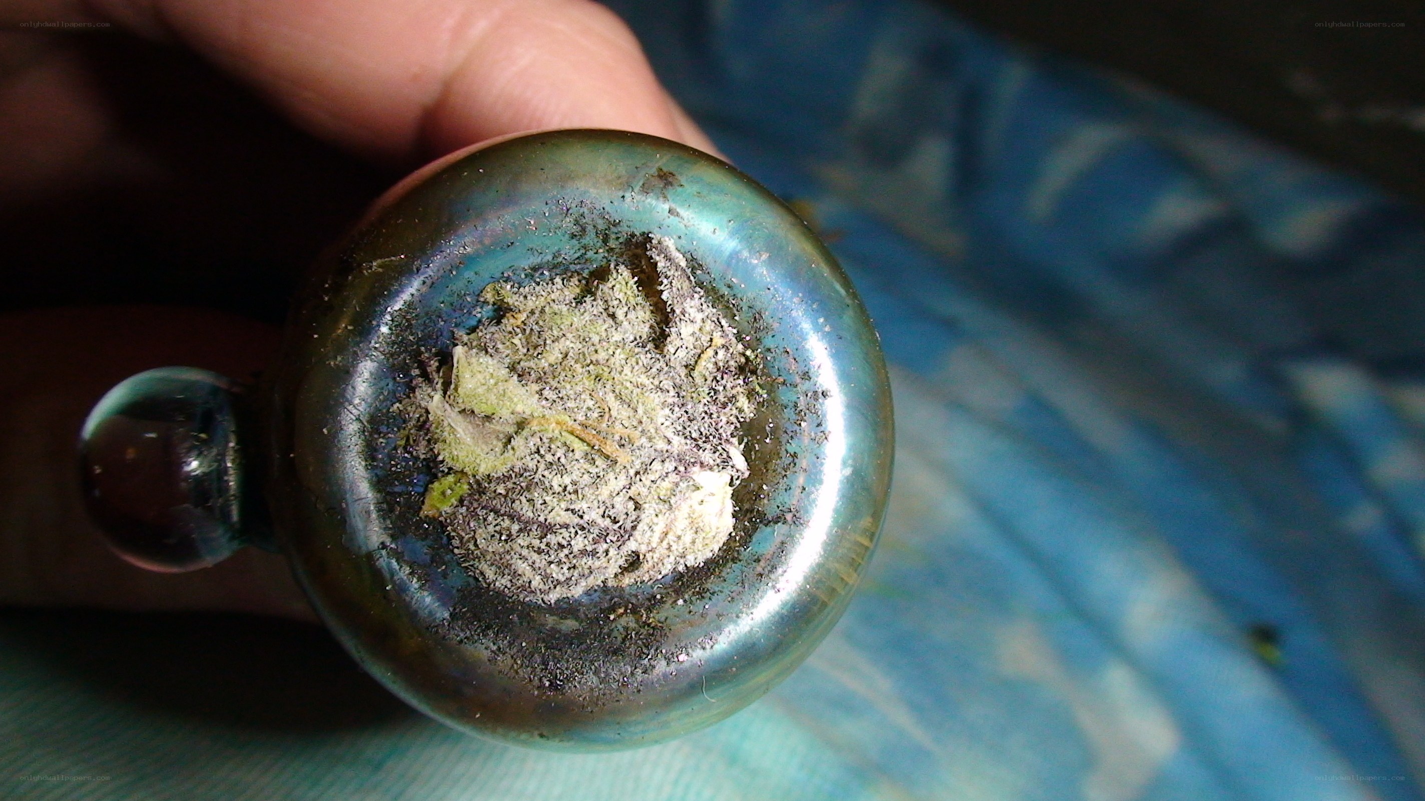 burnt cannabis in glass pipe