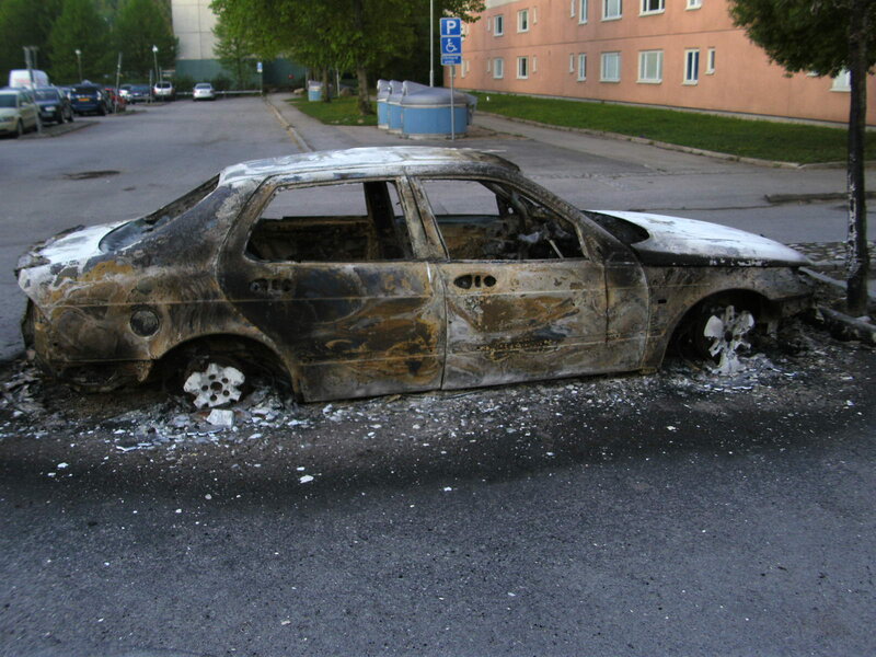 Burnt Car on Street — Black