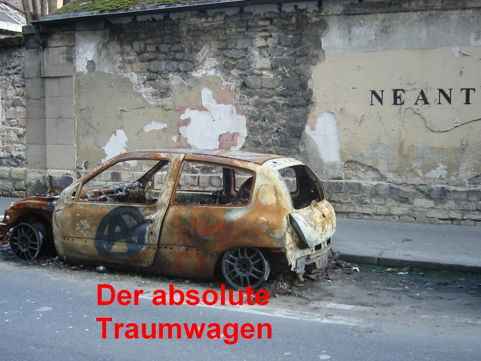 Burnt car on street