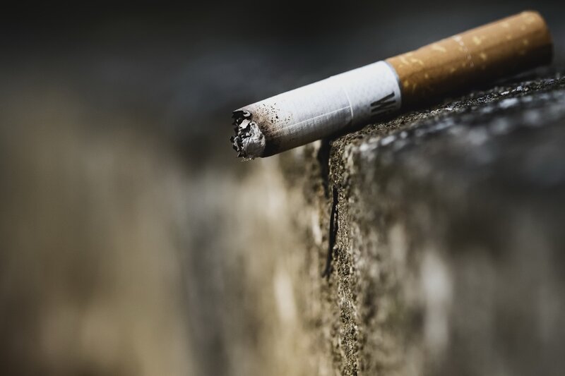 Burnt Cigarette on Ledge