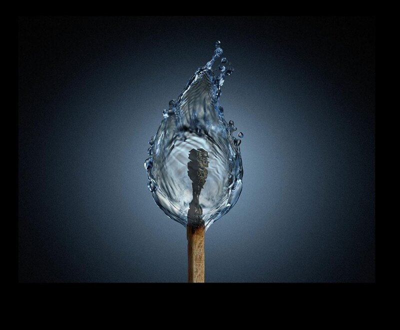 Burnt Match with Water Splash