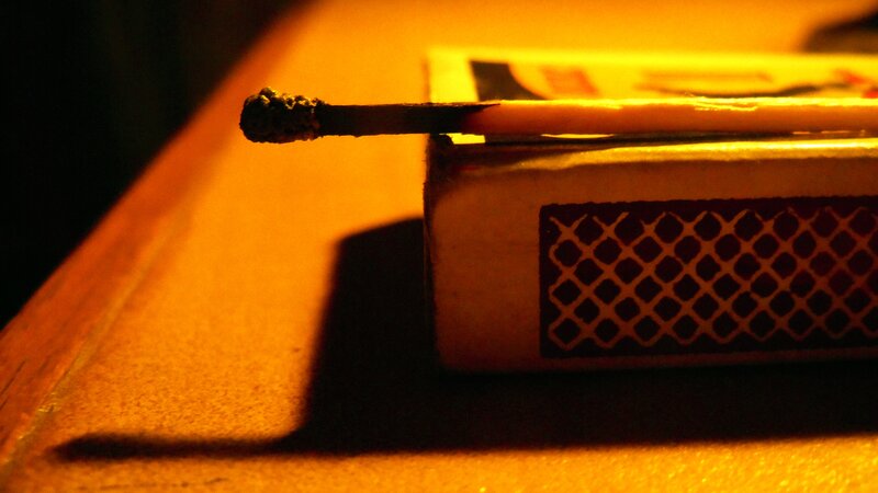 Burnt Matchstick on Box