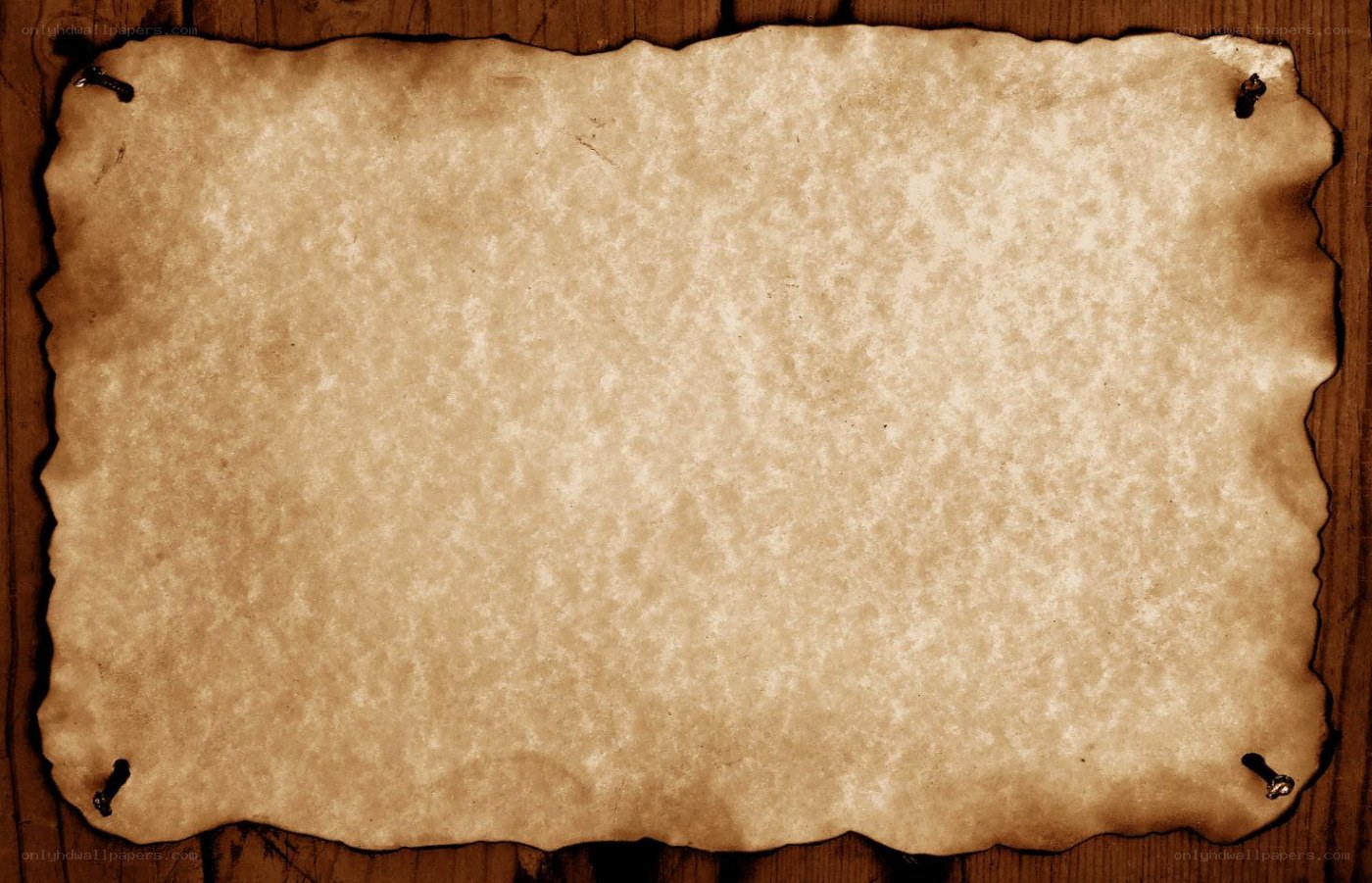 burnt parchment on wood