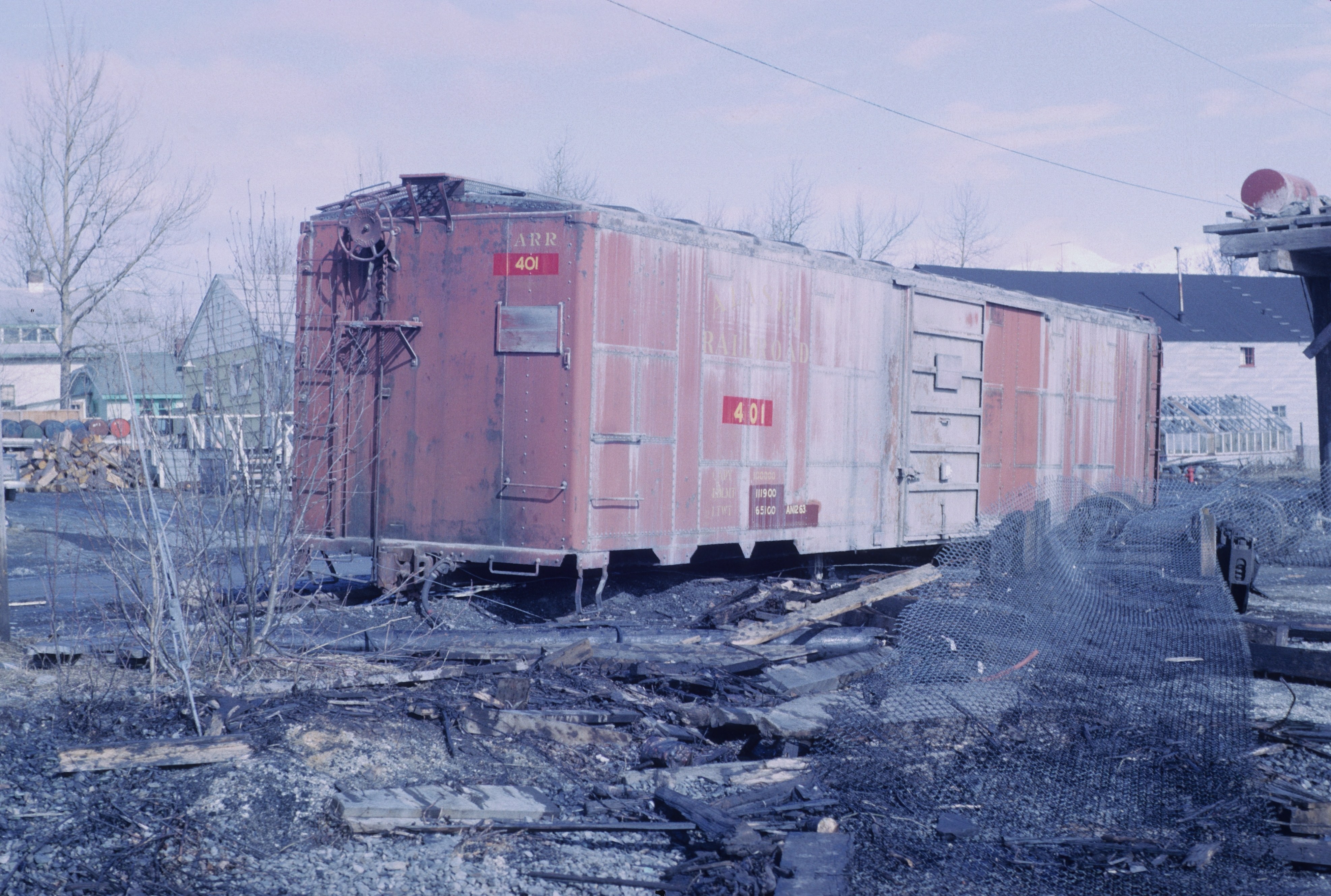Burnt train car at a rail yard