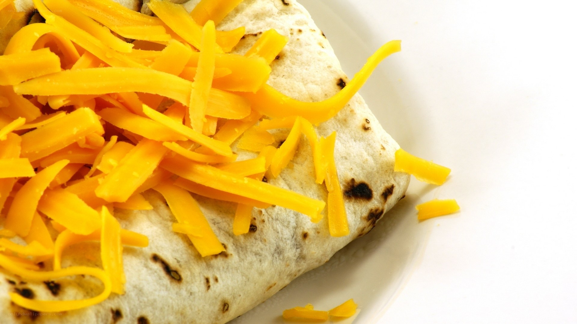 burrito with shredded cheese
