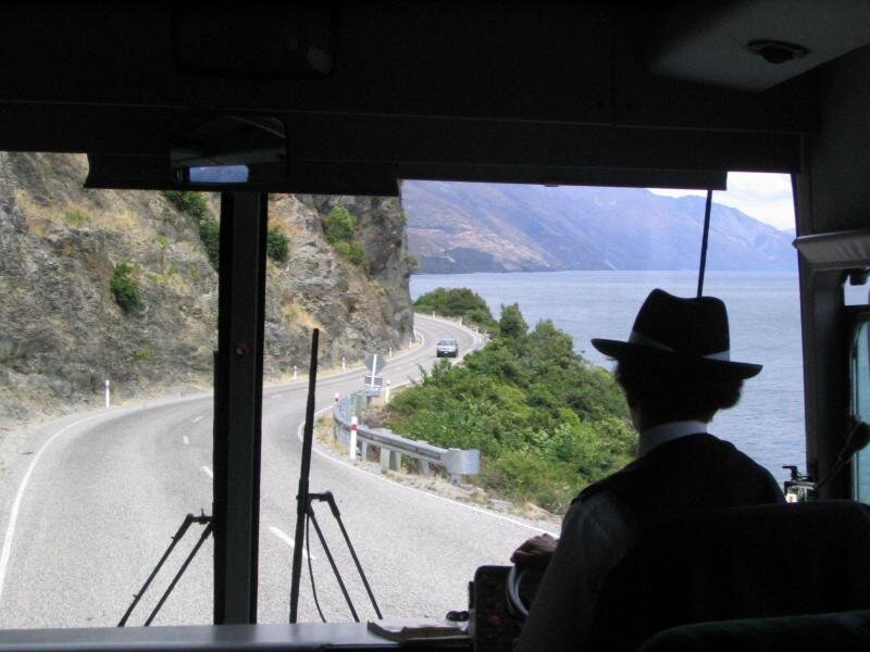 Bus Driver on a Coastal Road