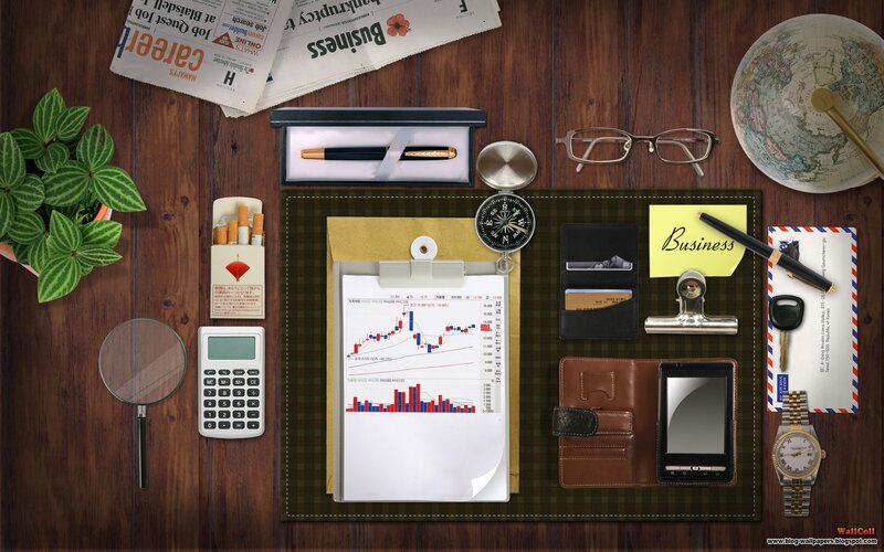 Business desk with financial charts