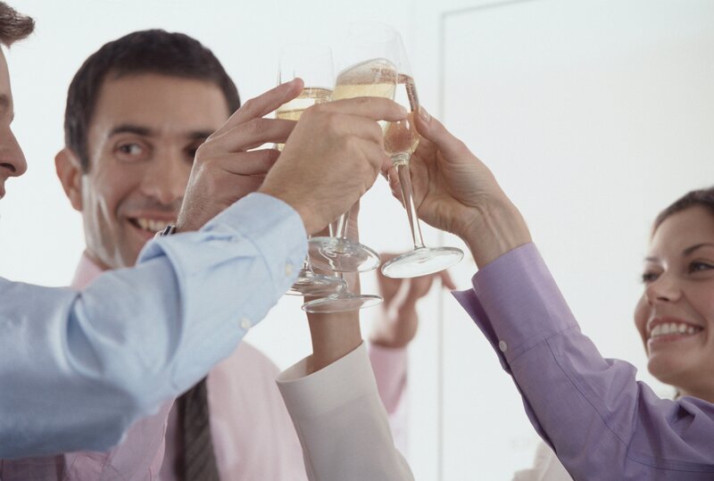 Business team toasting with champagne