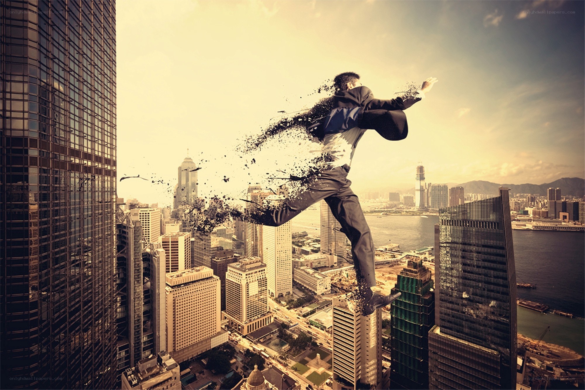 Businessman dissolving over city