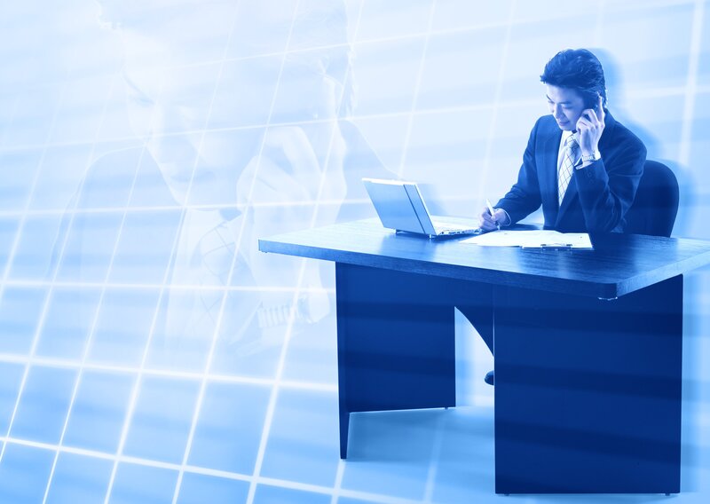 Businessman on phone at desk