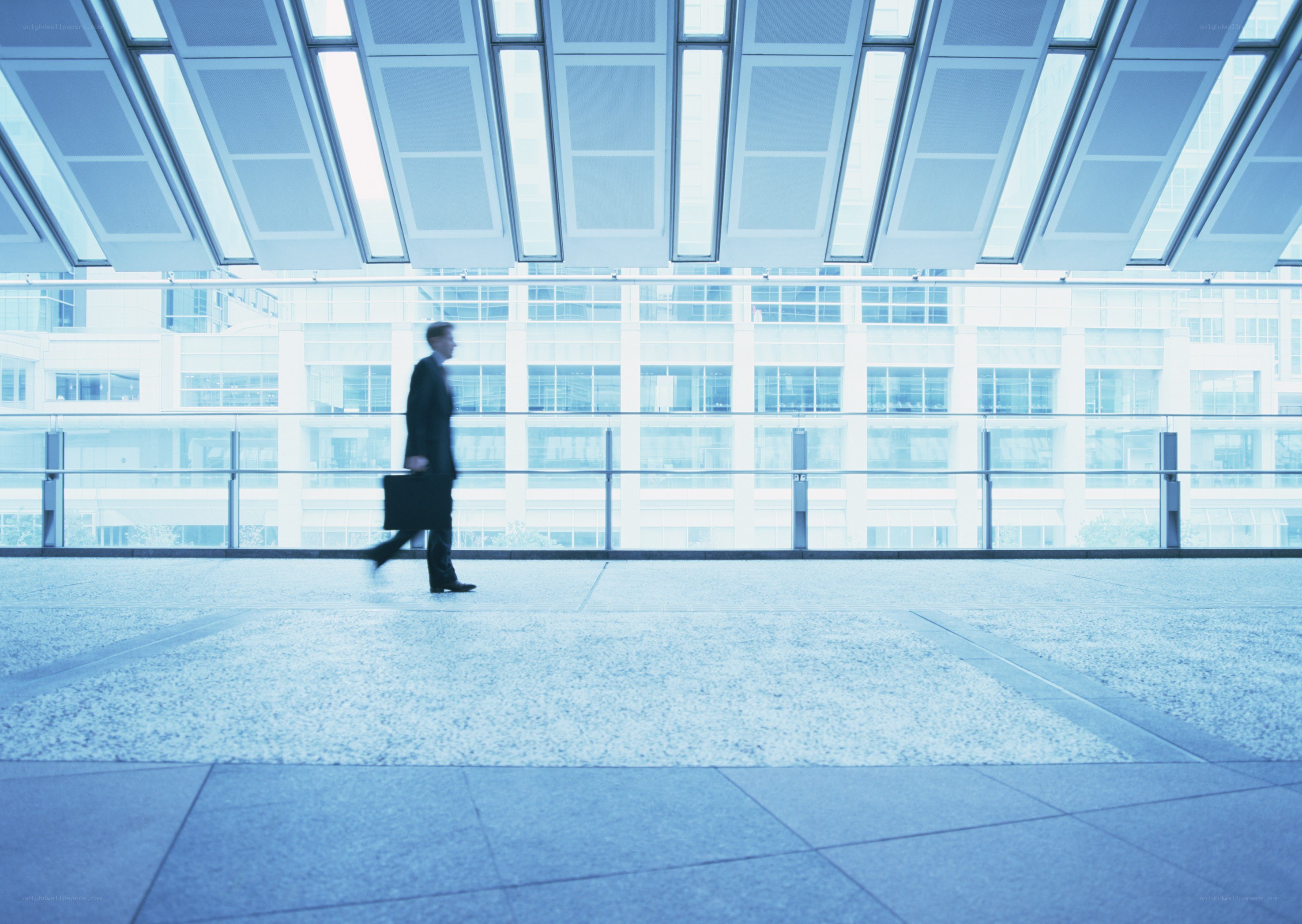 Businessman walking in modern building