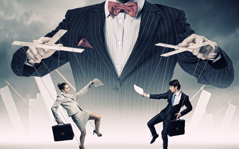 Businesspeople as Puppets