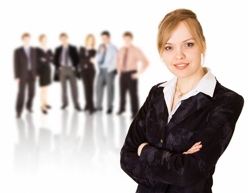 businesswoman with team in background