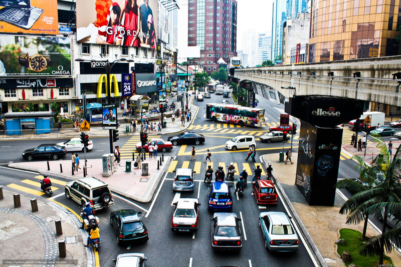 Busy city intersection with billboards