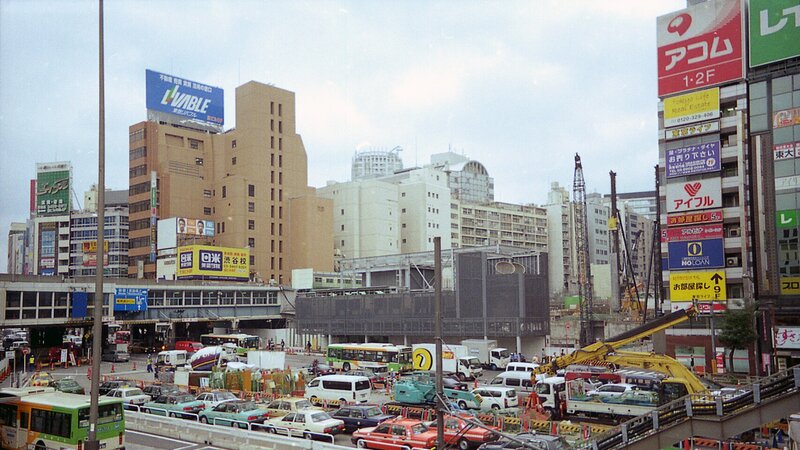 Busy city intersection with construction