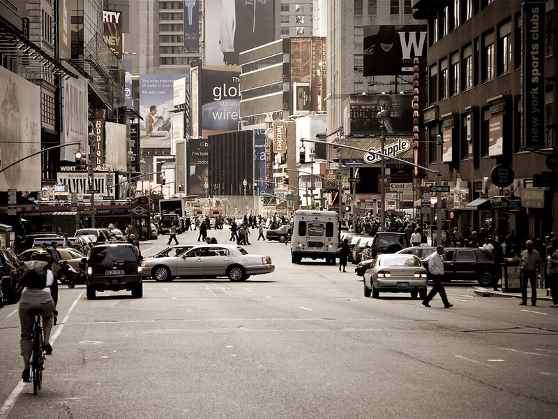 Busy city street with billboards