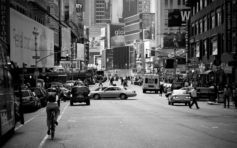 Busy city street with billboards