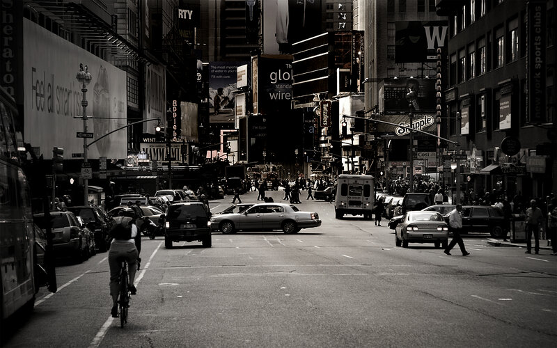 Busy city street with billboards