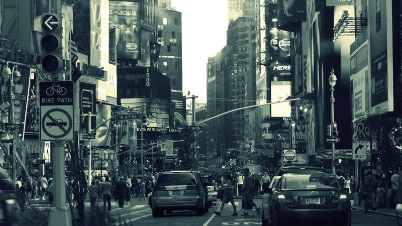 Busy city street with billboards