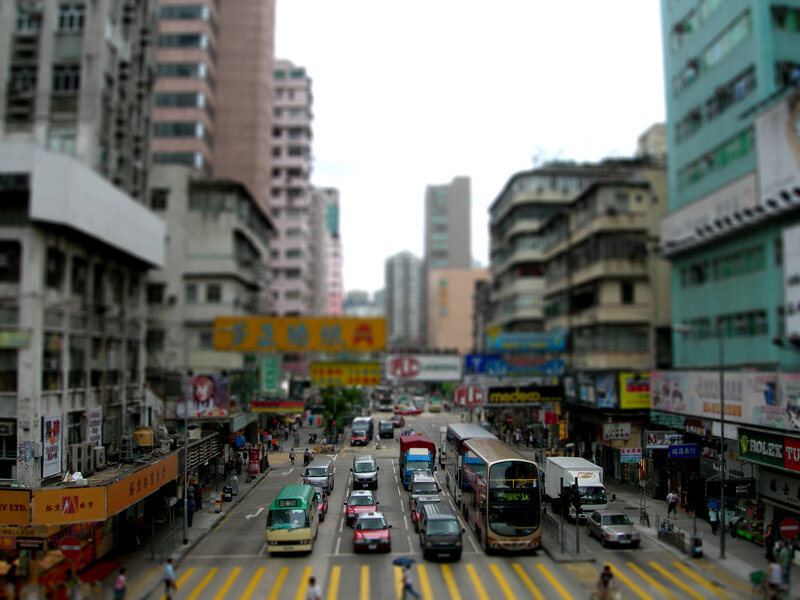 busy city street with buses and cars