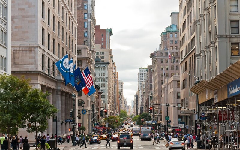 Busy City Street with Flags