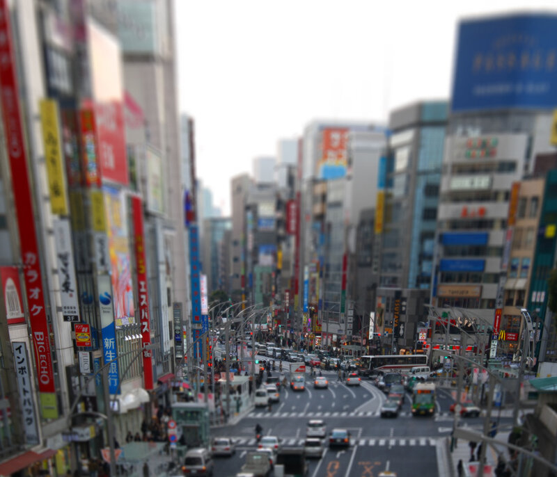 busy city street with tall buildings