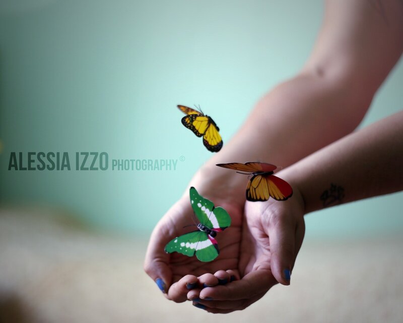 butterflies on cupped hands