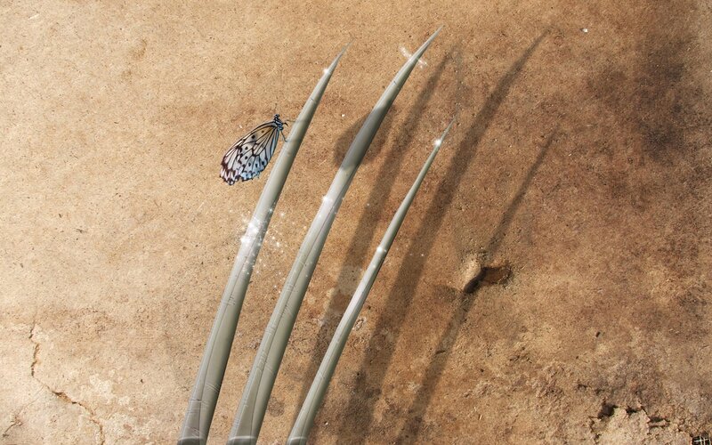 Butterfly on metal claws