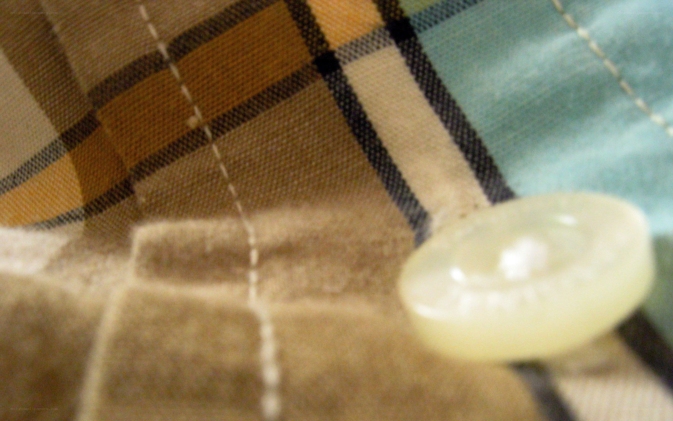 button on plaid fabric