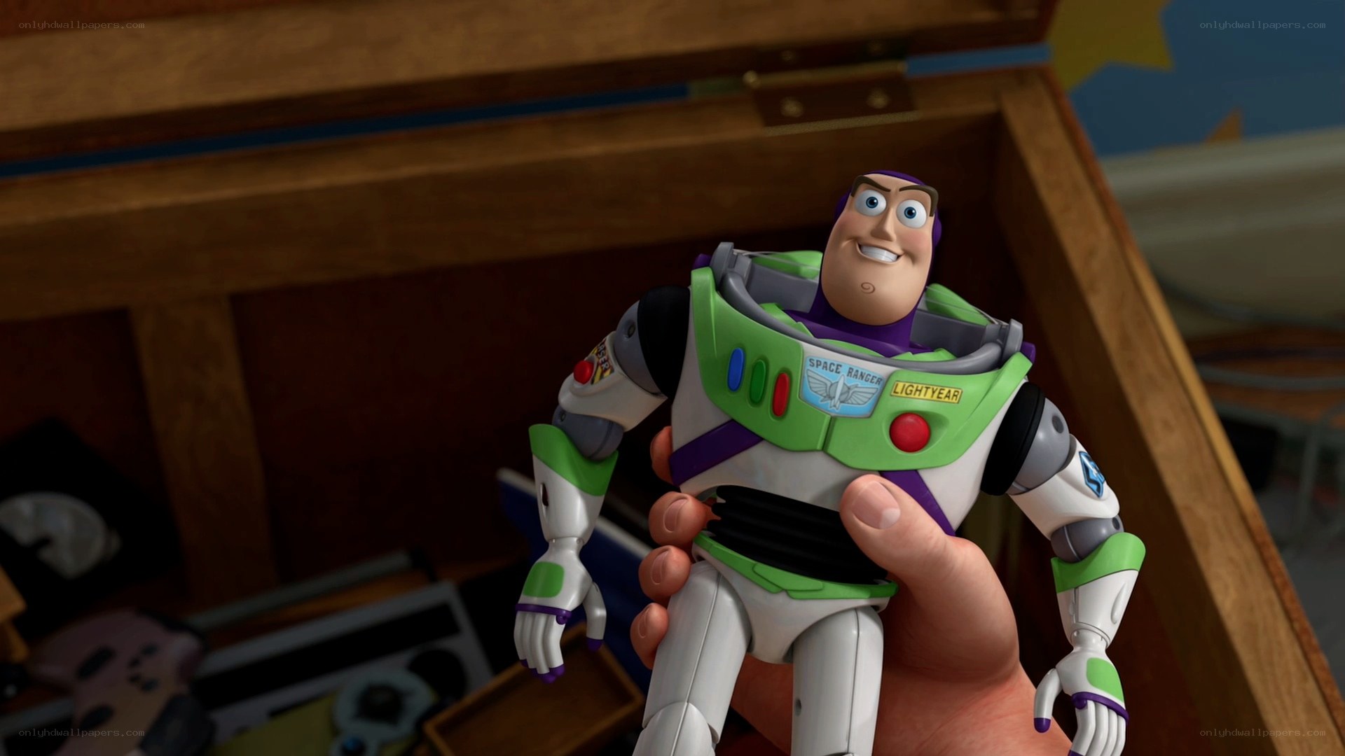 Buzz Lightyear toy in hand