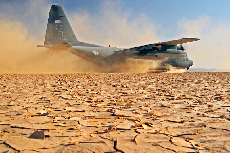 C-130 Hercules on a dusty runway