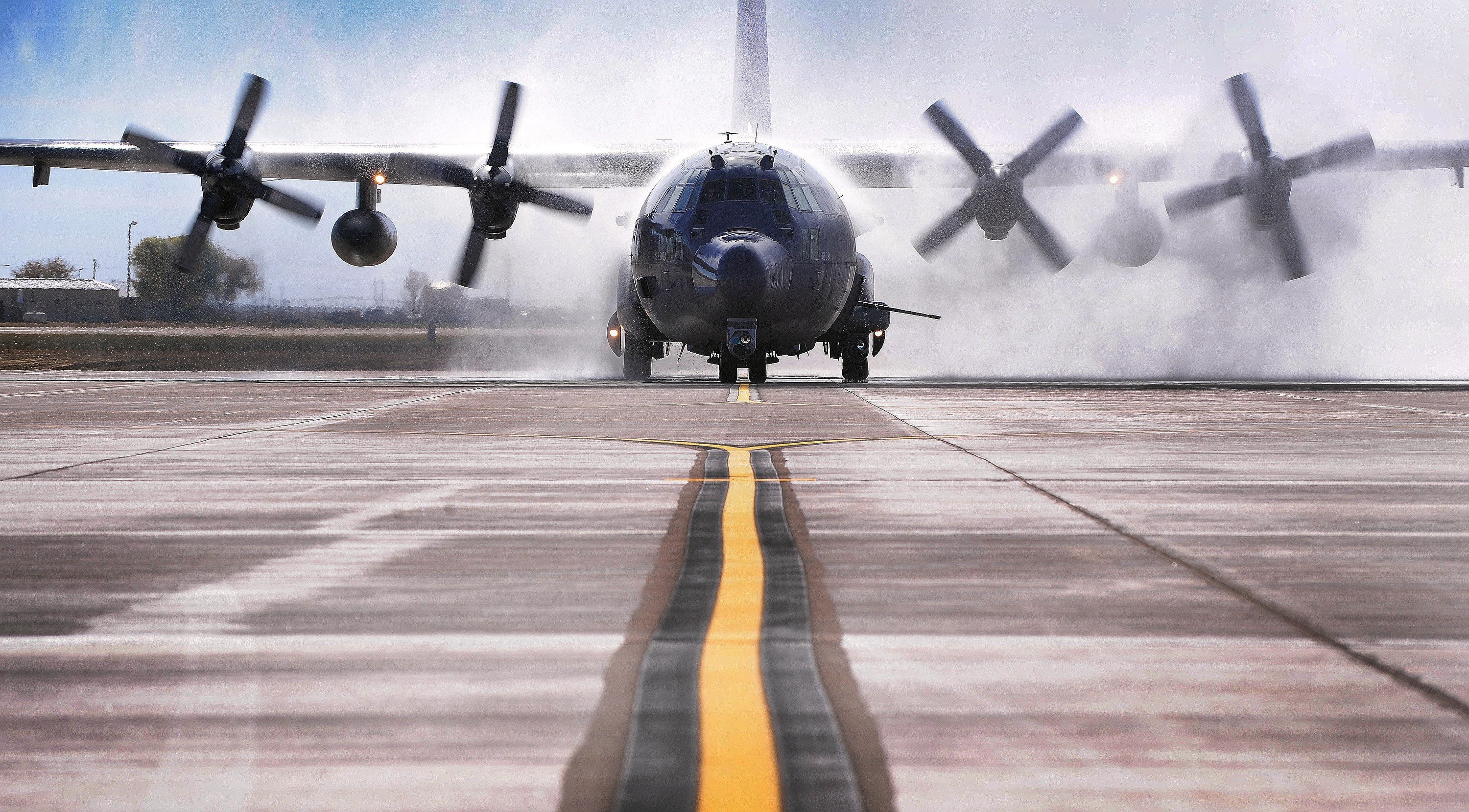 C-130 Hercules on wet runway