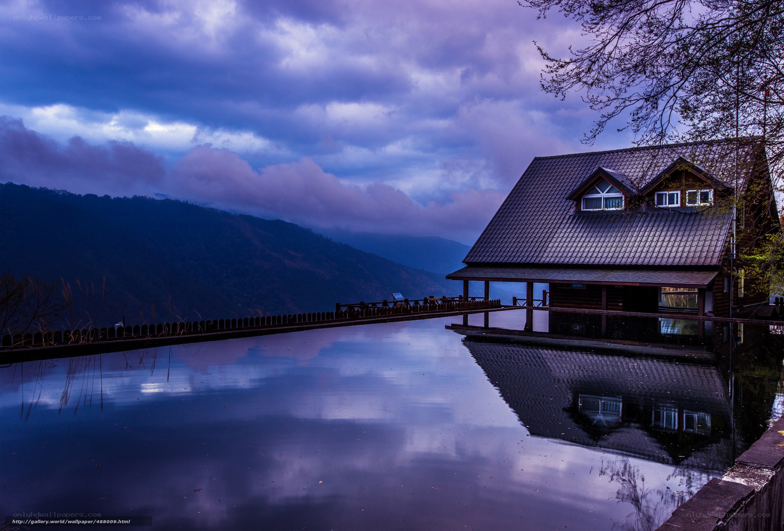 Cabin by the lake at dusk