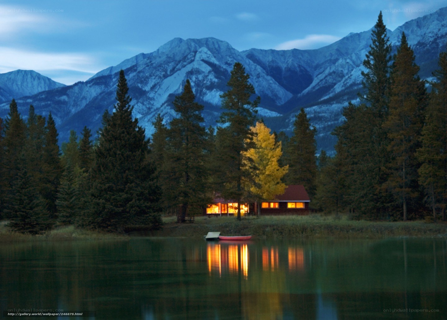 Cabin by the lake at dusk