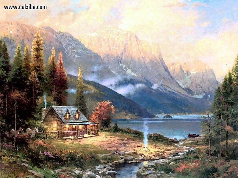 Cabin by the lake at sunset
