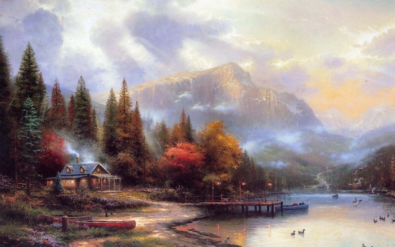 Cabin by the lake at sunset