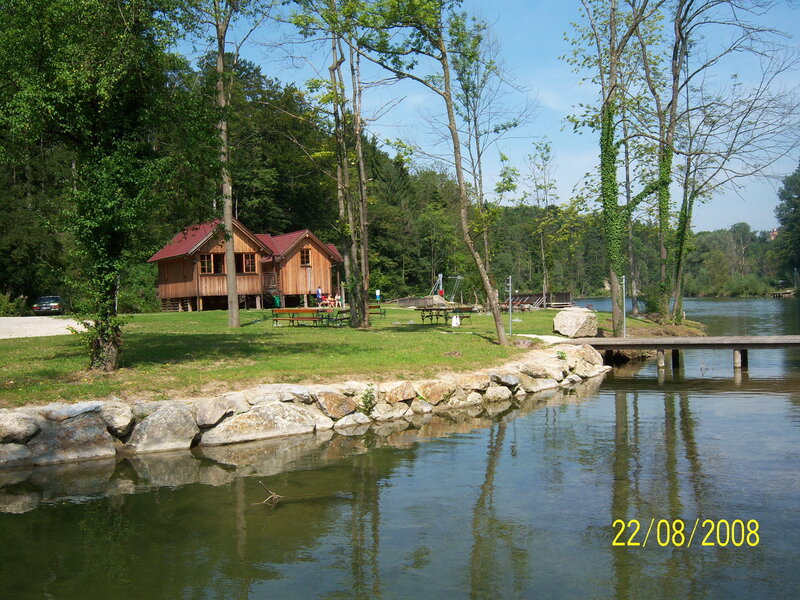 Cabin by the lake on a sunny day