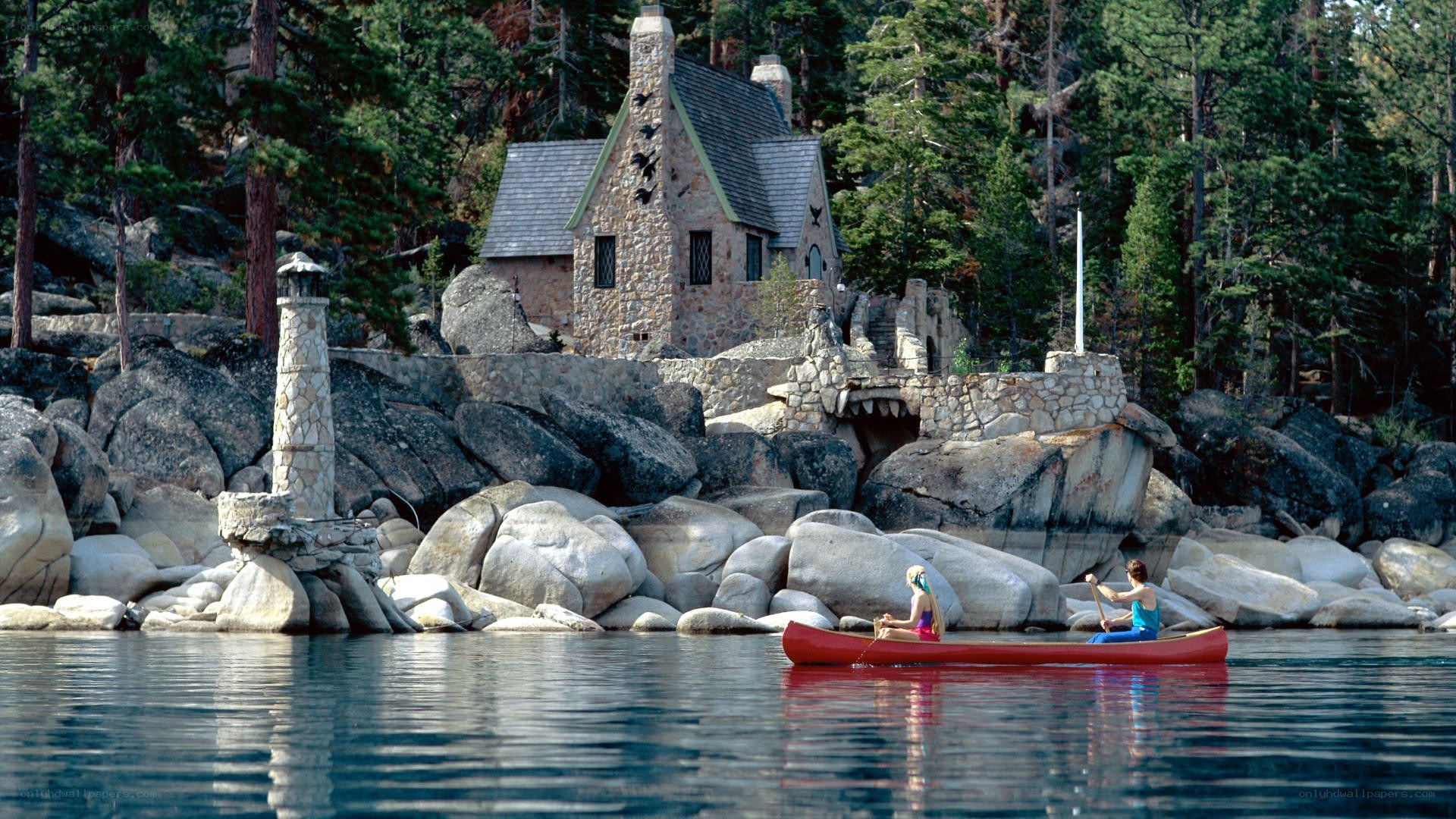Cabin by the lake with canoe