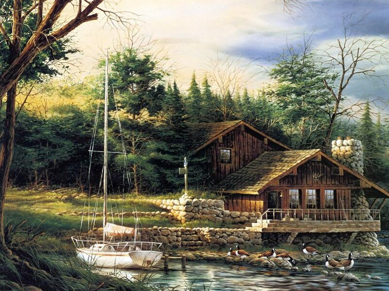 Cabin by the lake with sailboat