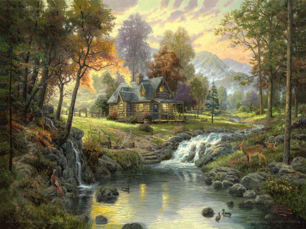 Cabin by the stream at sunset