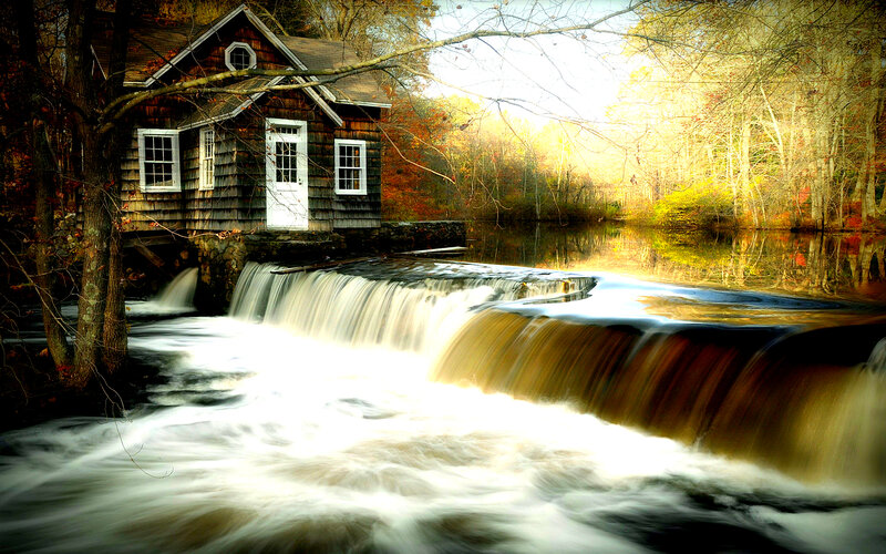 Cabin by Waterfall