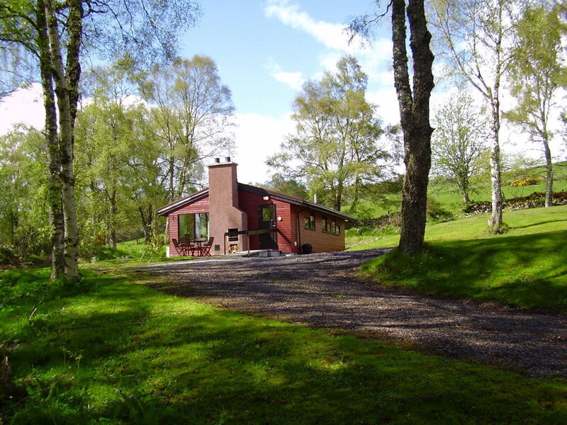 Cabin in a wooded landscape