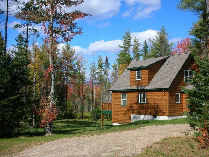 Cabin in autumn forest