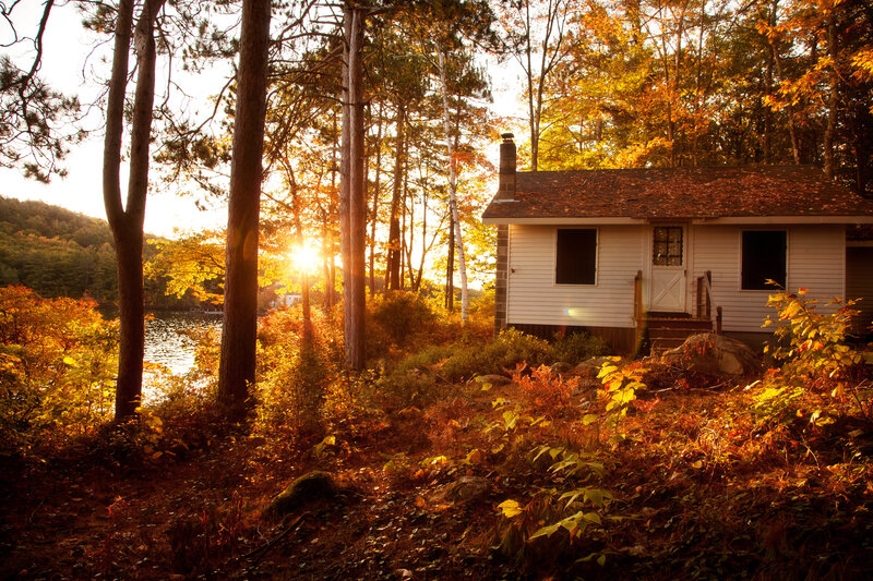 Cabin in Autumn Forest — Orange, Serene, Sunset