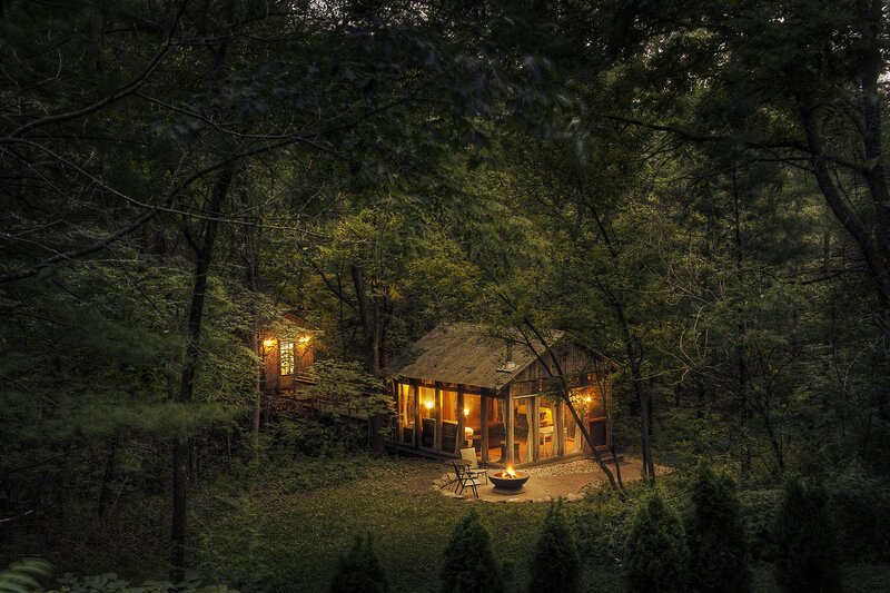 Cabin in Forest — Green, Serene, Night, Photograph, Fire Pit