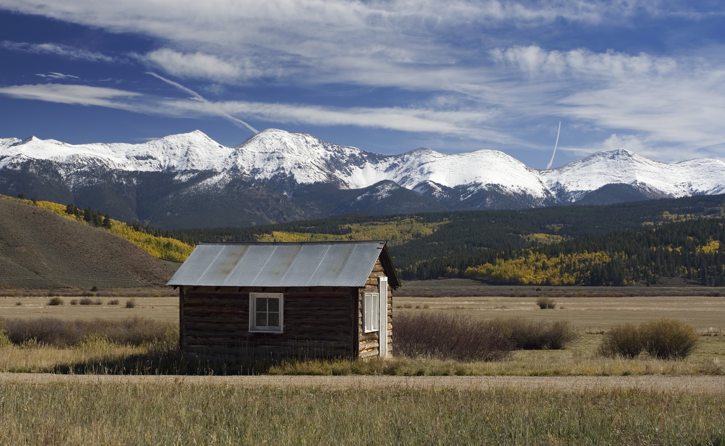 Cabin in mountain valley