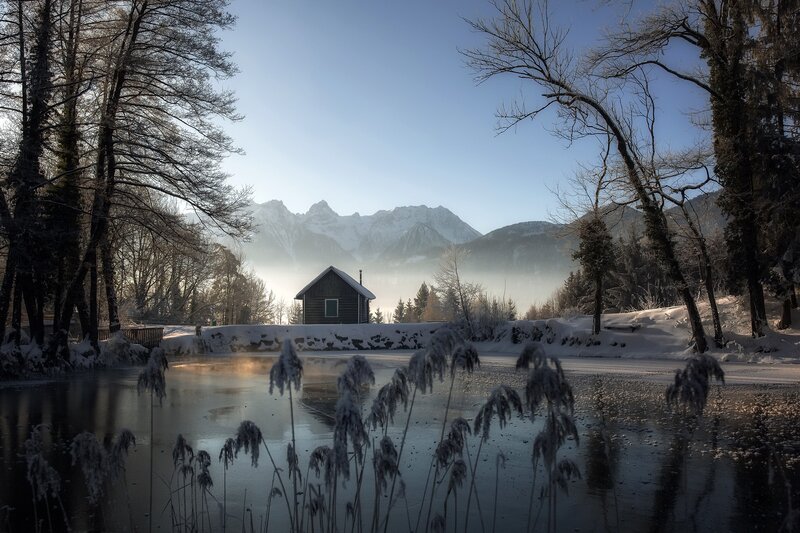 Cabin in Snowy Landscape — Blue, Serene, Winter, Photograph, Mountains, River