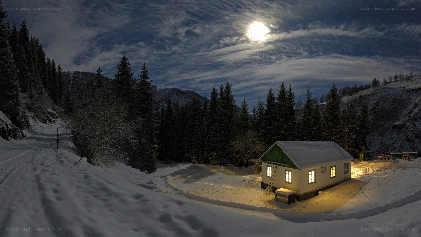 Cabin in snowy mountains
